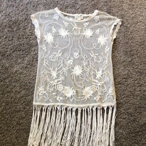 Sheer cream top with fringe